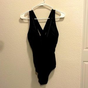New without tags black one piece, super flattering!
